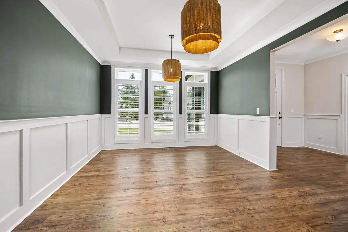 White wainscoting wall paneling in a room